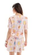 postcard print tie front blouse