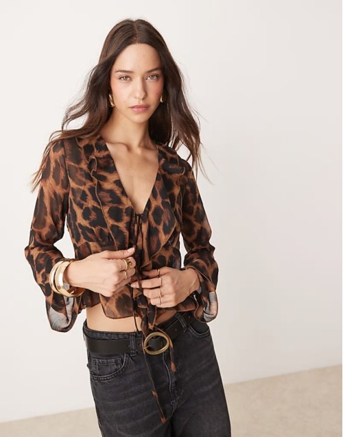 ruffle front shell top in leopard print