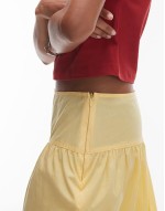 poplin full skirt with curved dropped waistband in yellow
