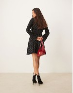 Lydia mini dress in black and white spot